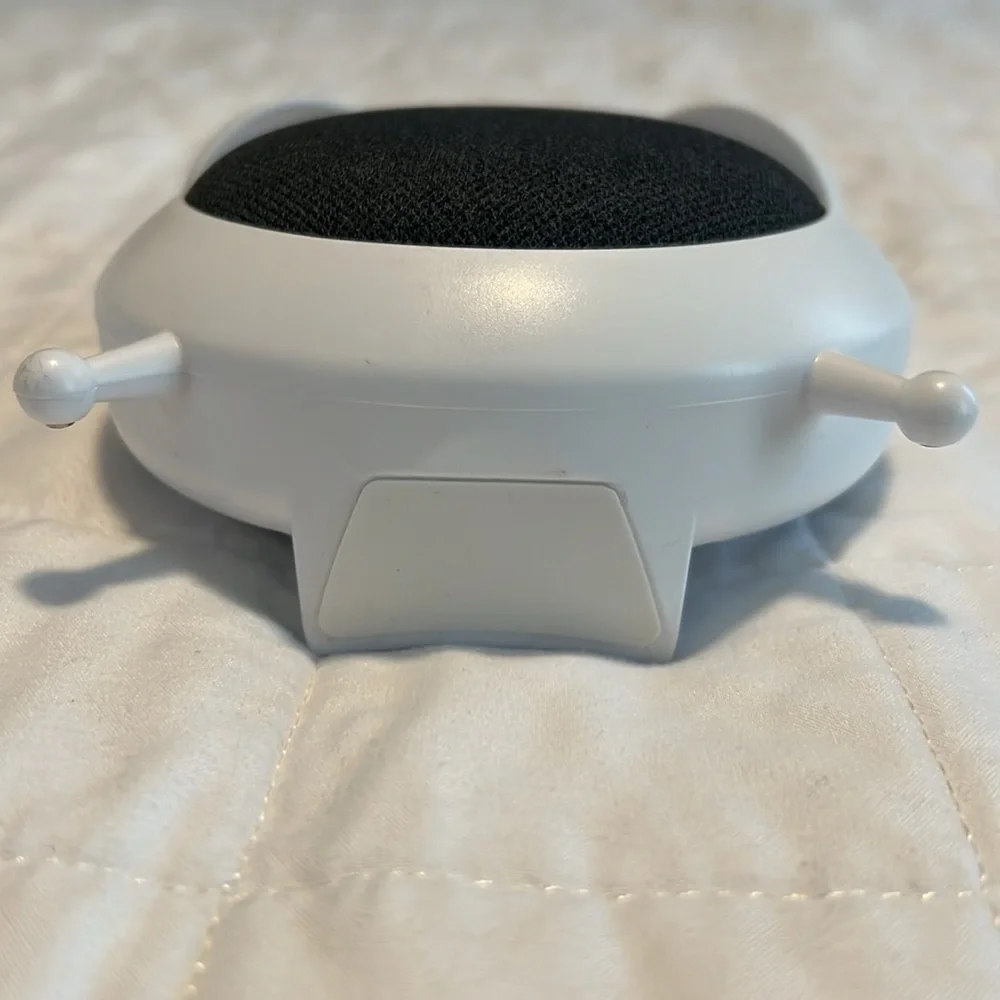 Google nest mini 2nd generation, with alarm clock case.